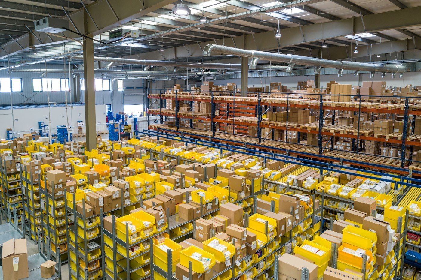 Plastic storage bins in a wholesale warehouse