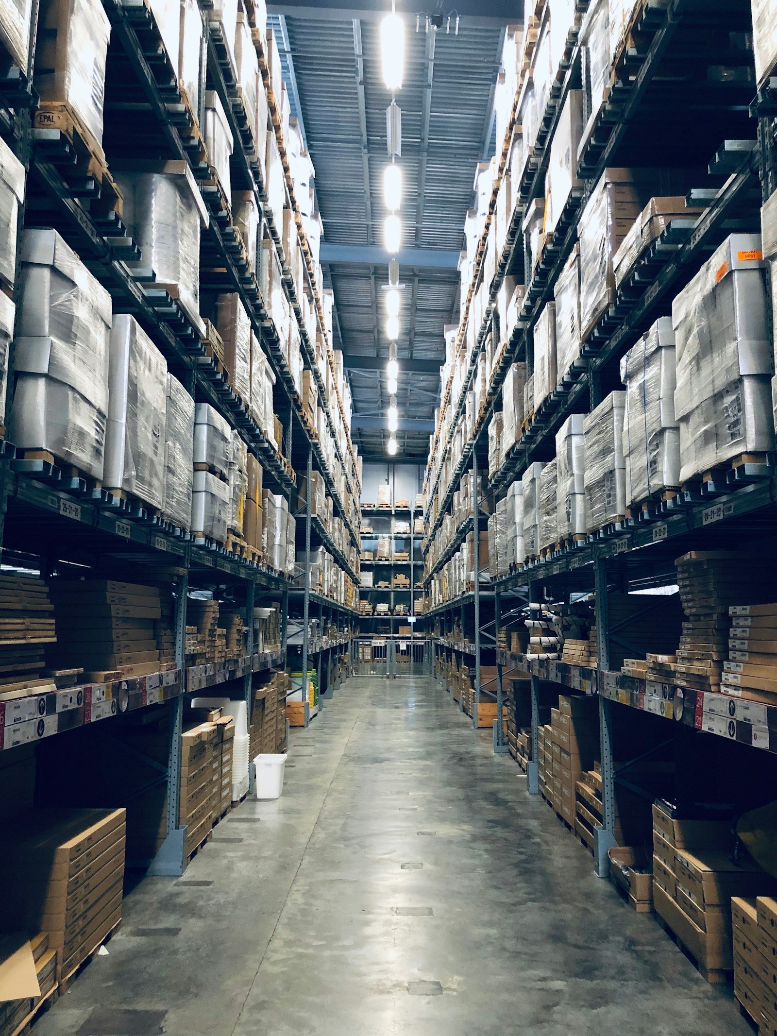 Warehouse aisle stocked with packed goods